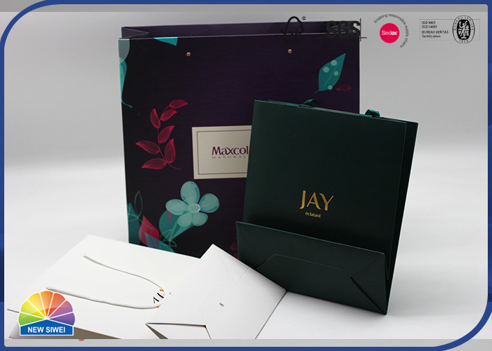 El sellado de oro de CMYK imprimió compras del papel del regalo empaqueta de lujo con el logotipo de encargo