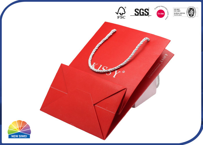 Impresión de lujo 250gsm Art Paper Shopping Bags Silver que sella con las manijas de nylon de la cuerda